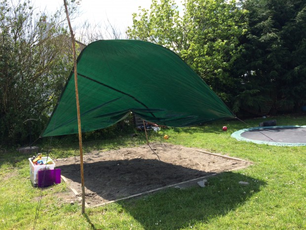 A tarpaulin in the child-friendly garden 